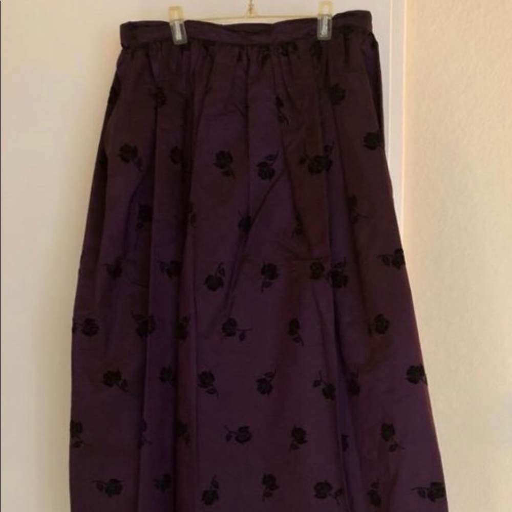 Formal plum colored skirt with velvet roses